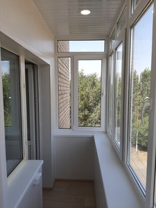 Комплексное решение - остекление и отделка балкона